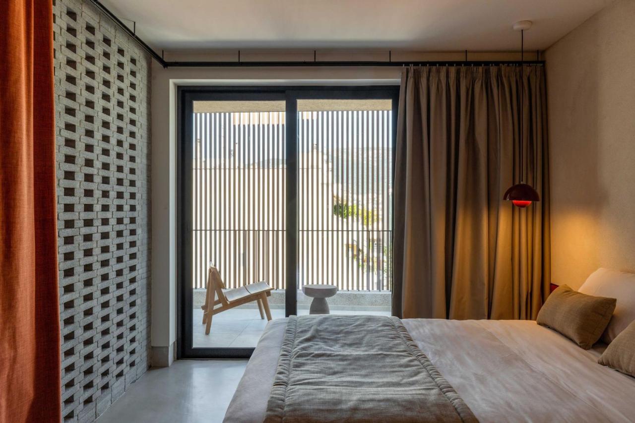 雅典 The Newel Psychiko酒店 外观 照片 A bedroom at the hotel